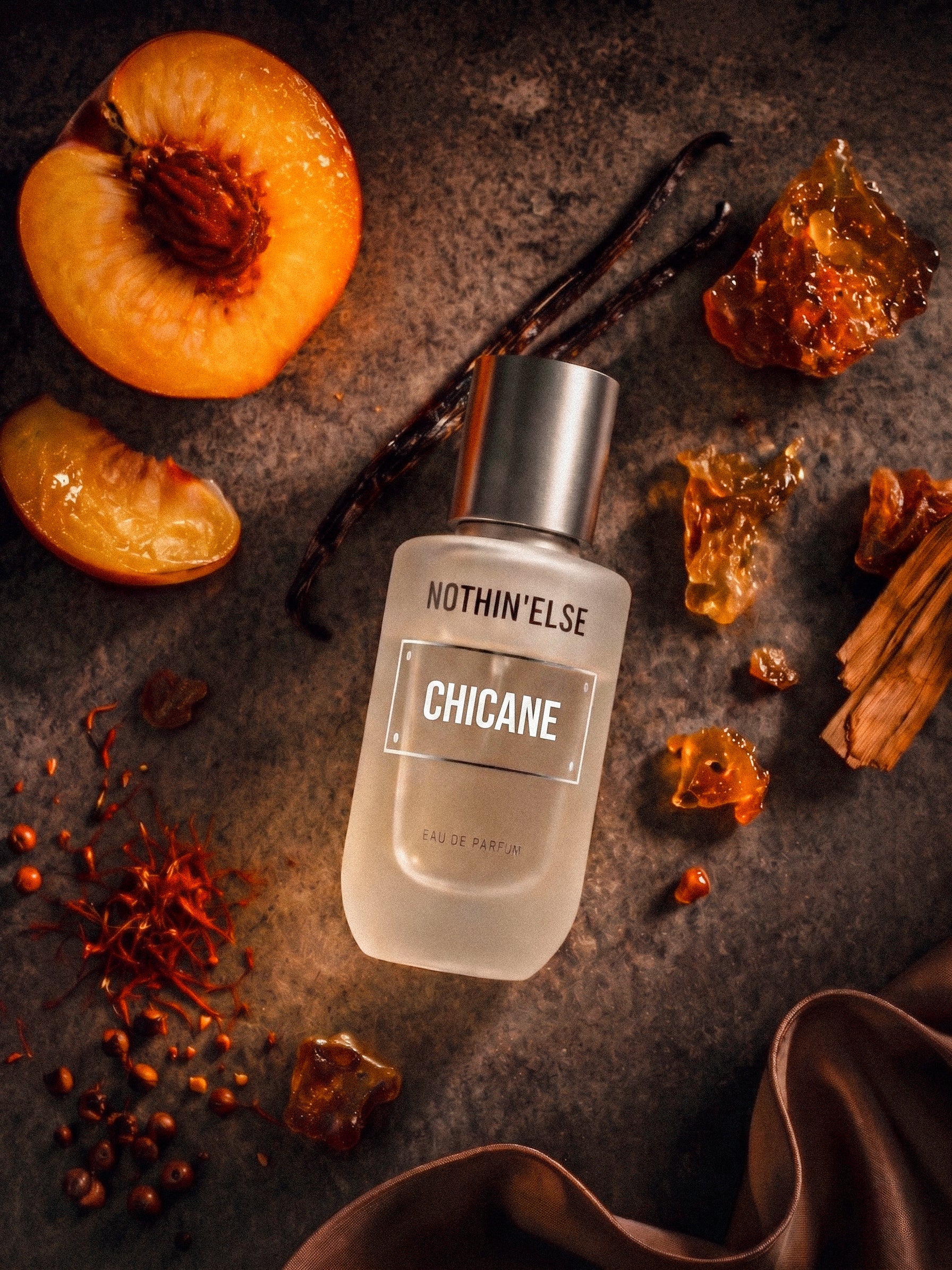 Nothin'else Chicane surrounded by its own notes. Peach, amber, vanilla, Saffron, Amberwood
