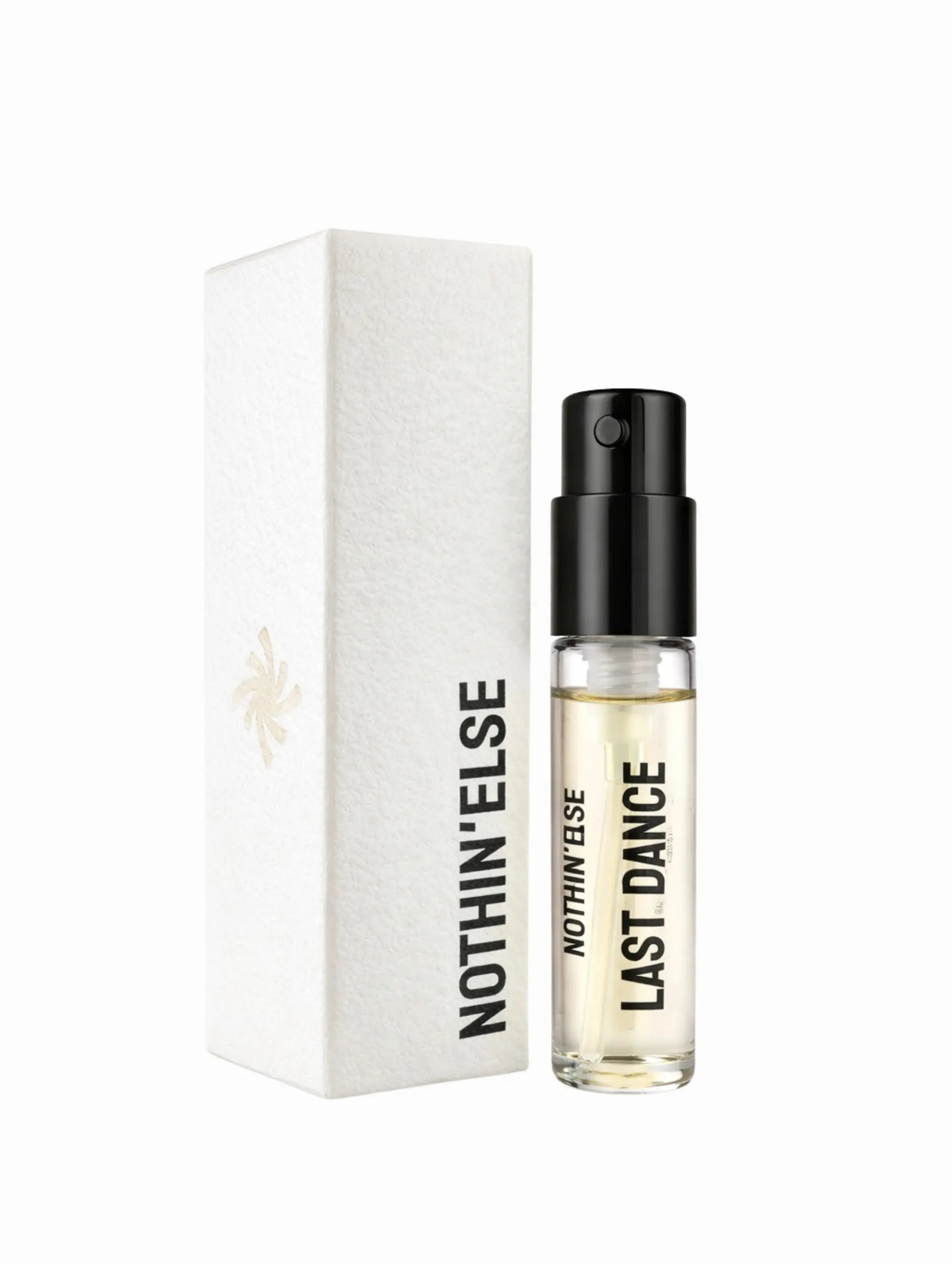 Perfume bottle labeled 'Last Dance' by 'Nothin' Else' with packaging on a white background