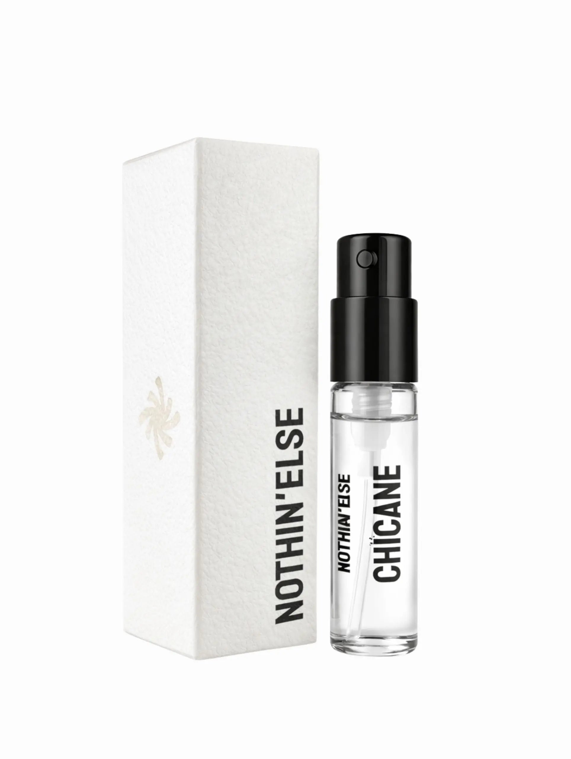 Perfume bottle and packaging labeled 'Nothin' Else Chicane' on a white background